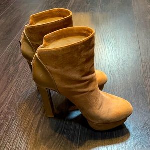 Beige suede high heeled booties